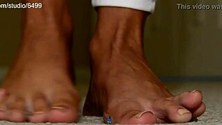 Giant woman crushes tiny toys under her huge sexy feet