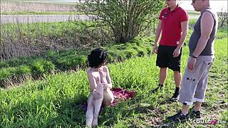 Two young guys fuck german nudist granny on beach