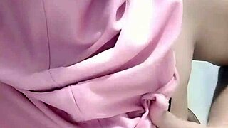 bu guru hijab masturbates big tits and pussy solo