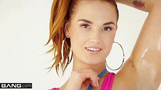 Busty redhead Siri Dahl oiled up riding monster cock doggystyle hardcore.