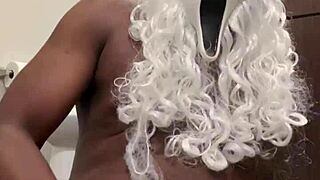 santa grabs my hand for close-up nut busting help