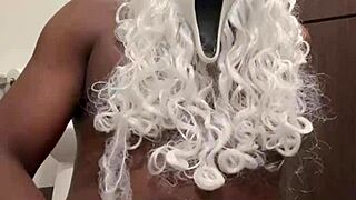 santa grabs my hand for close-up nut busting help