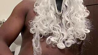 santa grabs my hand for close-up nut busting help