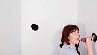 Secretary sucks dildo through glory hole in sexy lingerie roleplay