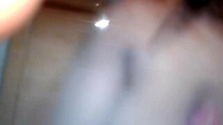 brown sugar shoves dildo deep in her shaved pussy