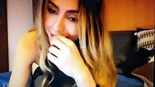 sexy blonde teases viewers with flirty looks and webcam talk