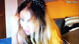 sexy blonde teases viewers with flirty looks and webcam talk