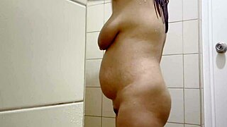 i love watching my indian stepmom's big boobs and hairy pussy glisten in the shower