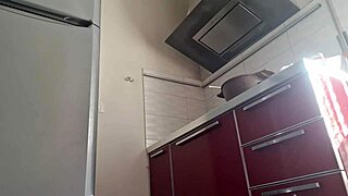 gostosa fingers her natural tits pussy while cooking hot