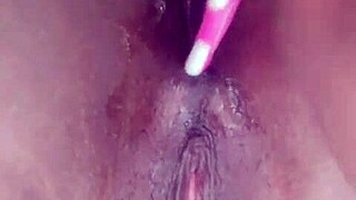 black ebony babe shoves brush deep in ass fucking herself