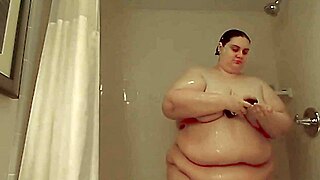 ssbbw xutjja lathers her huge saggy tits and shaves that fat shaved pussy in the shower