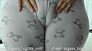 her plump camel toe lips peek out teasingly before she spreads wide for the camera