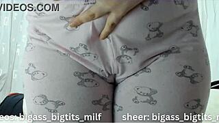 her plump camel toe lips peek out teasingly before she spreads wide for the camera