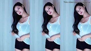 cute chinese girl dances her big tits teasingly