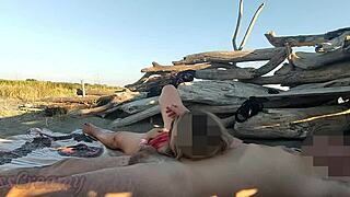 A stranger spots stepdad fingering misscreamy's pussy on the beach. She jerks his throbbing dick in public view.