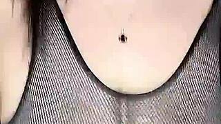 mesh stockings hug her body as cock fucks huge natural tits from above