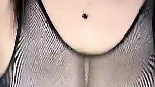 mesh stockings hug her body as cock fucks huge natural tits from above