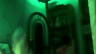 Amateur latina couple sensually enjoys homemade webcam in the dark.