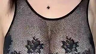 mesh stockings hug her body as cock fucks huge natural tits from above