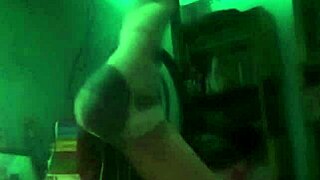 Amateur latina couple sensually enjoys homemade webcam in the dark.