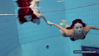 Katrin And Lucy's Big Tits Bounce Underwater At Beach Pool
