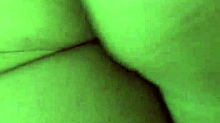 milf's wet pierced clit shines in close-up ass massage
