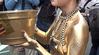 Nude Gold Powder Show With Slipped Costume Exposing Nipples