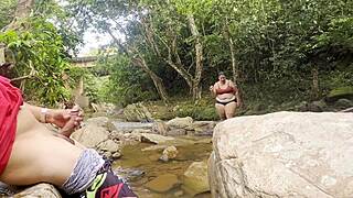 unknown river handjob babe lets me milk her huge tits