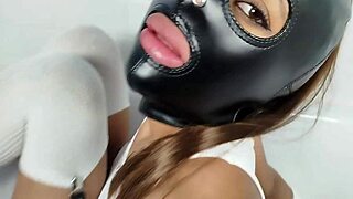 wanna facefuck this leather-masked bitch in the tub?