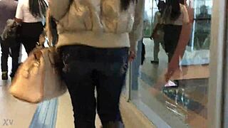 street train jacket boots candid nylon jeans hidden ass tease
