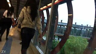 street train jacket boots candid nylon jeans hidden ass tease