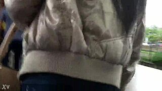 street train jacket boots candid nylon jeans hidden ass tease