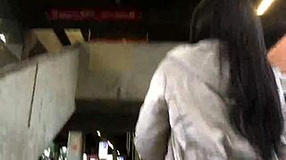 street train jacket boots candid nylon jeans hidden ass tease