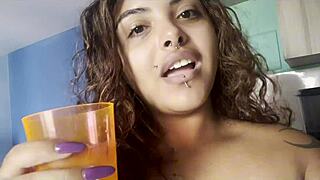 Curvy amateur sips coffee naked chatting big tits on cam