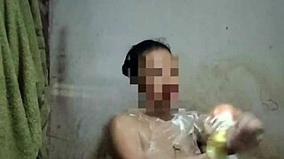 stunning indonesian housewife, baring big tits and pussy in steamy shower?