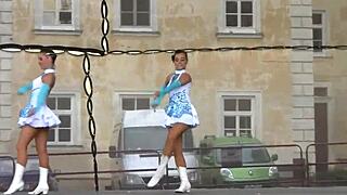 two cheerleaders show off perfect curves