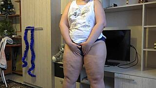 chubby christmas milf with big ass enjoys anal-vaginal double toy penetration