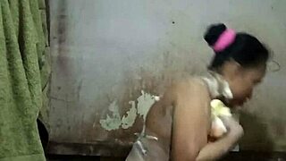 stunning indonesian housewife, baring big tits and pussy in steamy shower?
