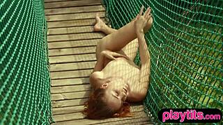 slender russian redhead teases perky small tits outdoors undressing softly