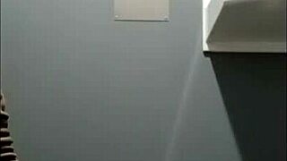 french slave bound in leather harness exhibits during outdoor autoseance