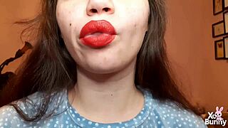 big red lips brunette smokes while teasing curvy tits pov closeup