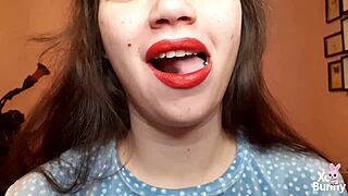 big red lips brunette smokes while teasing curvy tits pov closeup