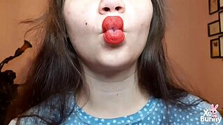 big red lips brunette smokes while teasing curvy tits pov closeup