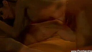 She dances sensually on bed stripping panties for exotic handjob play.