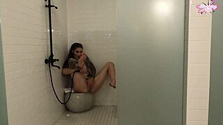 Tall Tattooed Slut Jerks Off Hairy Pussy in Steamy Shower Voyeur