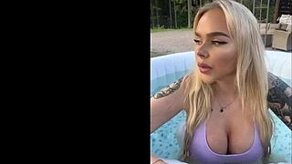 gringa flaunts her massive tits by the pool