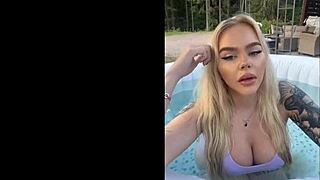 gringa flaunts her massive tits by the pool