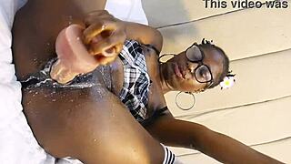 horny ebony teen crams huge dildos in pussy