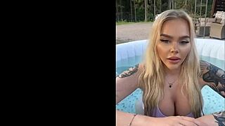 gringa flaunts her massive tits by the pool