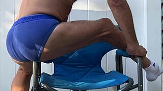 Deep Pelvic Stretches in Blue Briefs on Chair